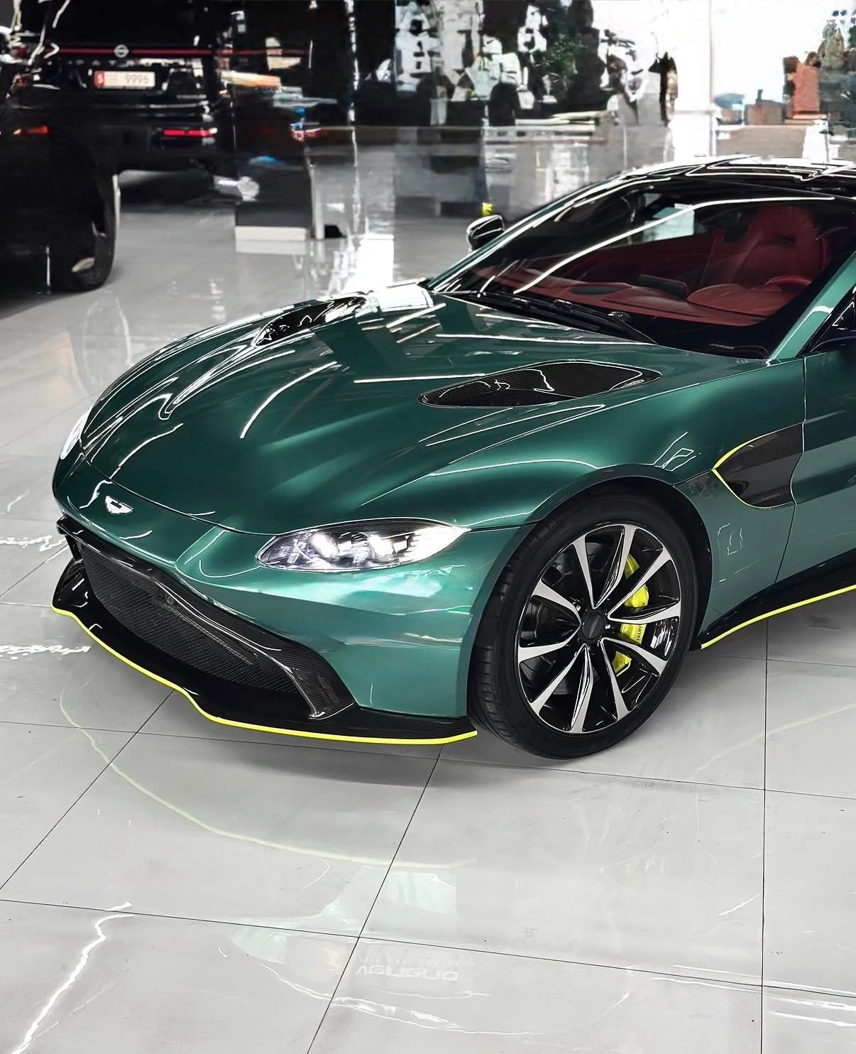 Green Aston Martin with lime details after film installation